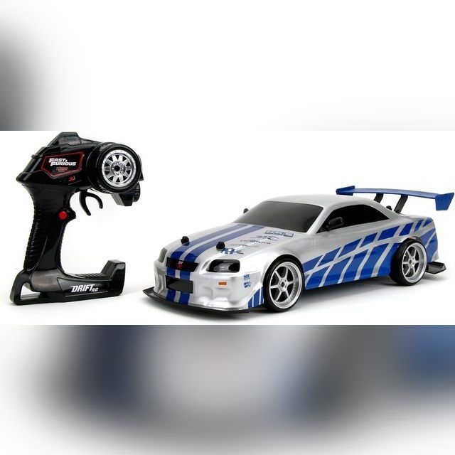 Radijo bangomis valdomas mašina Fast & Furious Brian's Nissan Skyline GT-R (R34) 1:10 Scale