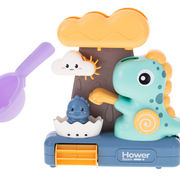 Bathroom toy shower with dinosaur reel